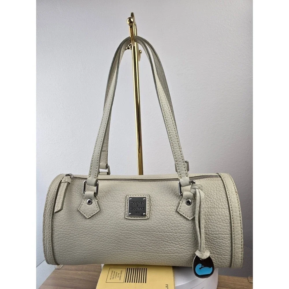 Dooney & Bourke Cream Pebbled Leather Barrel Shoulder Bag Marbled Lining